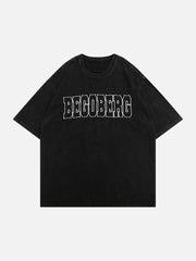 T-shirt délavé à lettres gothiques étoilées 