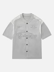 Polo ample à manches courtes et simple lettre de marque tendance 