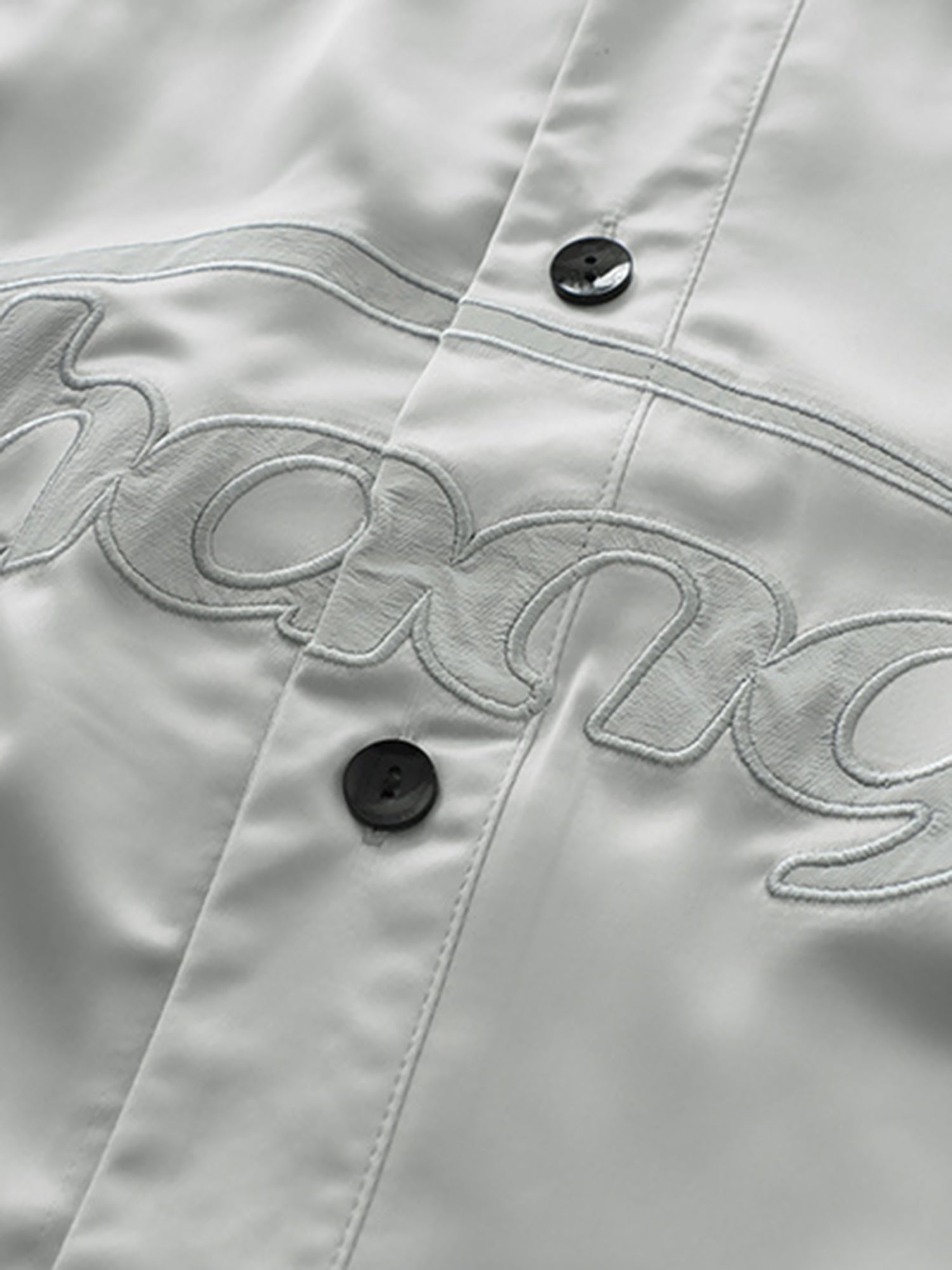 Polo ample à manches courtes et simple lettre de marque tendance 