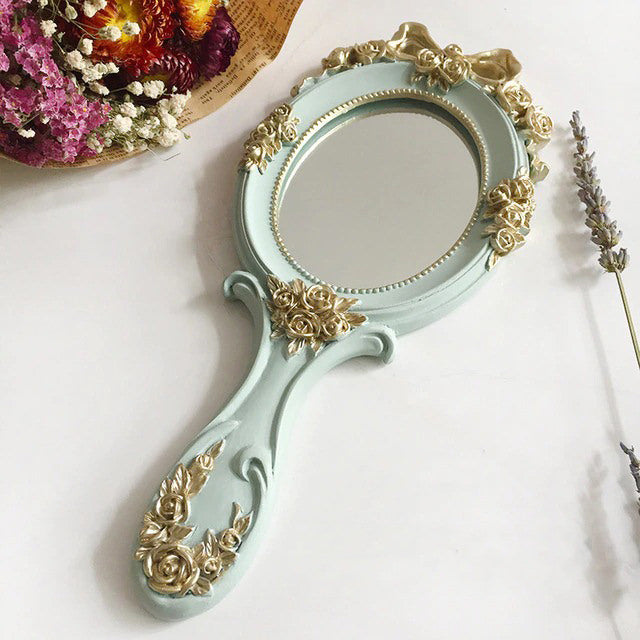 Miroir à main vintage rococo