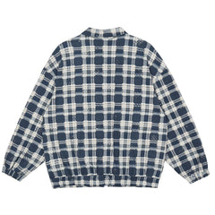 Veste à carreaux effilochés