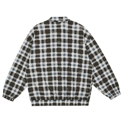 Veste à carreaux effilochés