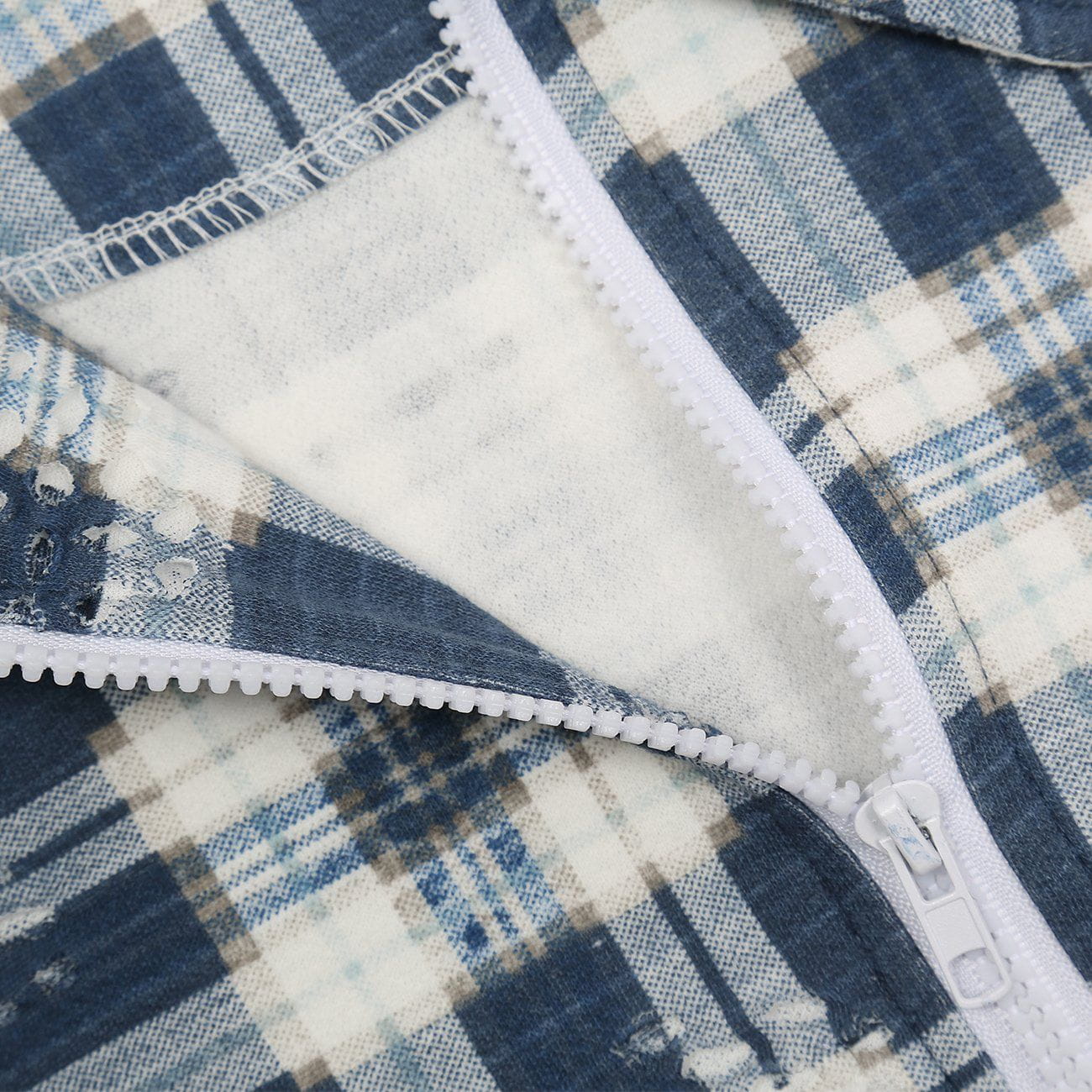 Veste à carreaux effilochés