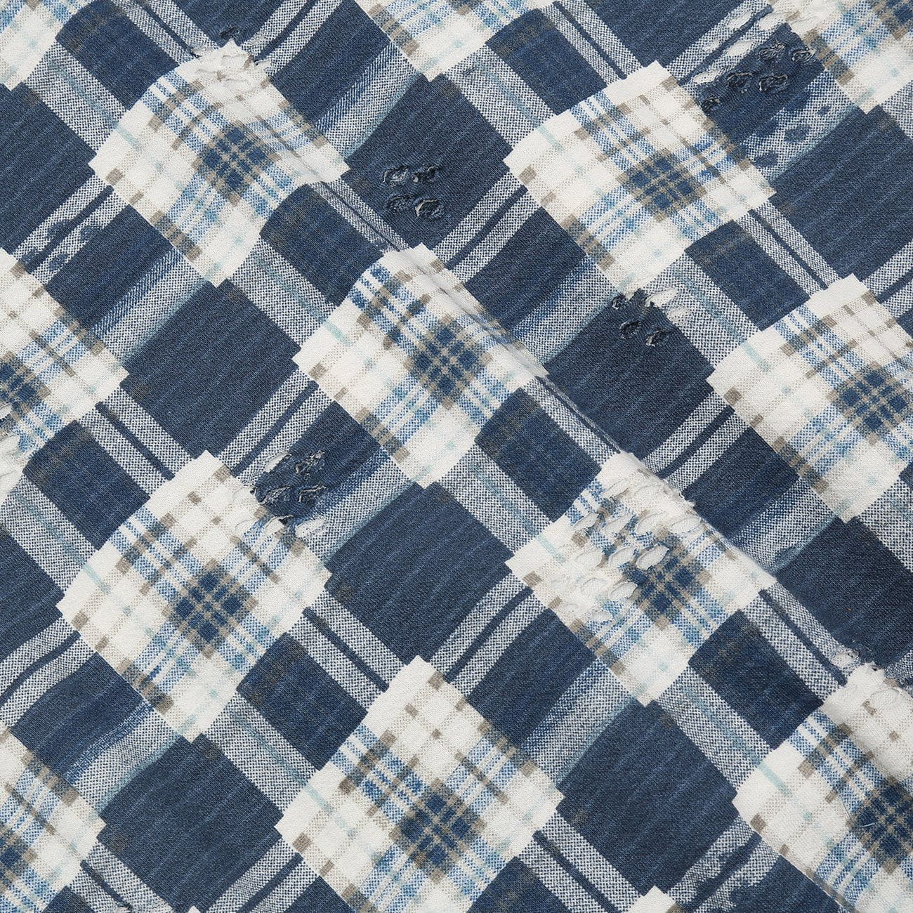 Veste à carreaux effilochés
