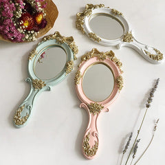 Miroir à main vintage rococo